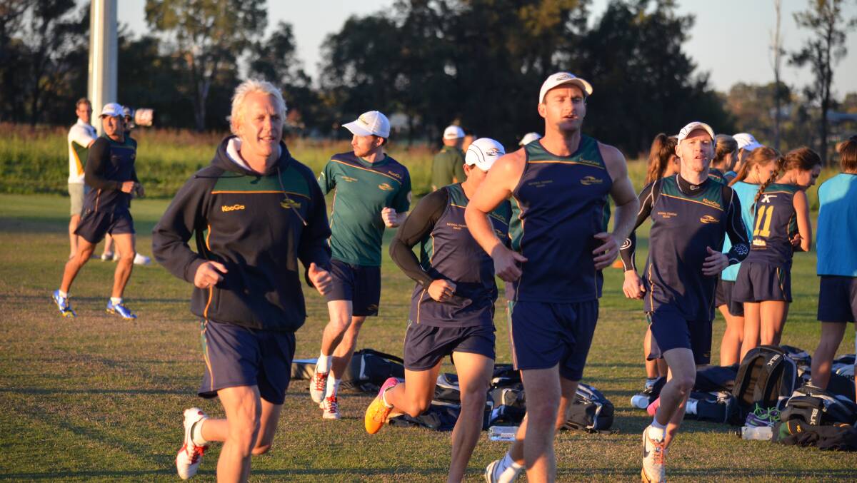 Australia men's open captain Steve Roberts leads his side for a run. Photo: BEN HARRIS