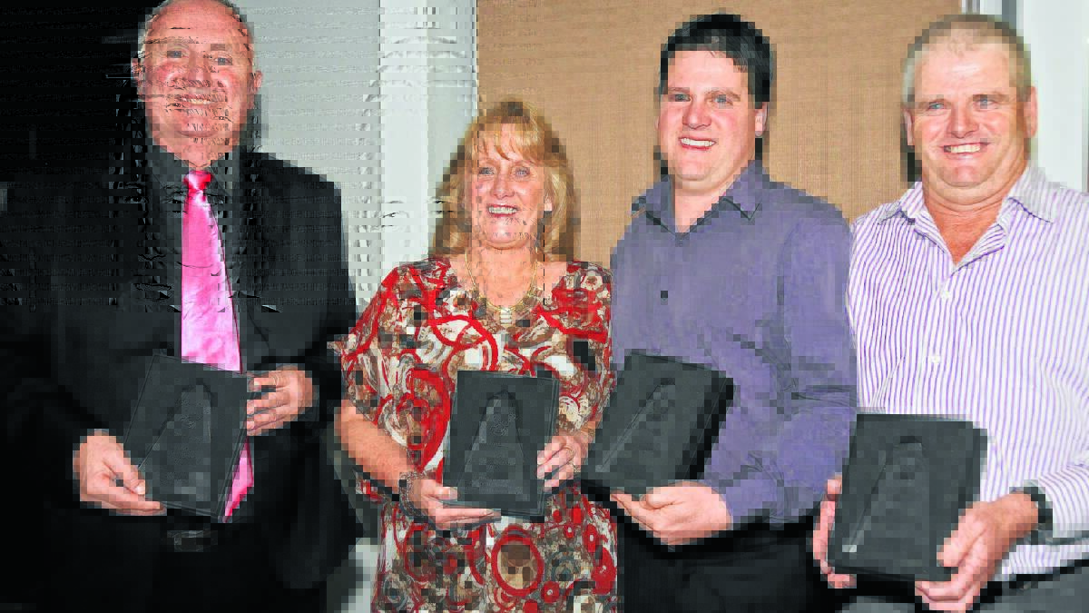 IN GOOD COMPANY: Mudgee Touch Association’s Roger Lang (left) and Peter “Skeeter” Doherty (right) received Blues awards at the NSW Touch’s Blues dinner last Saturday. The pair, along with fellow Mudgee touch life members Kathy Lang and Ben Stoddart, are four of the five Blues award recipients from the club. File photo: SANDY SMITH 	010913SSTOUCH1616