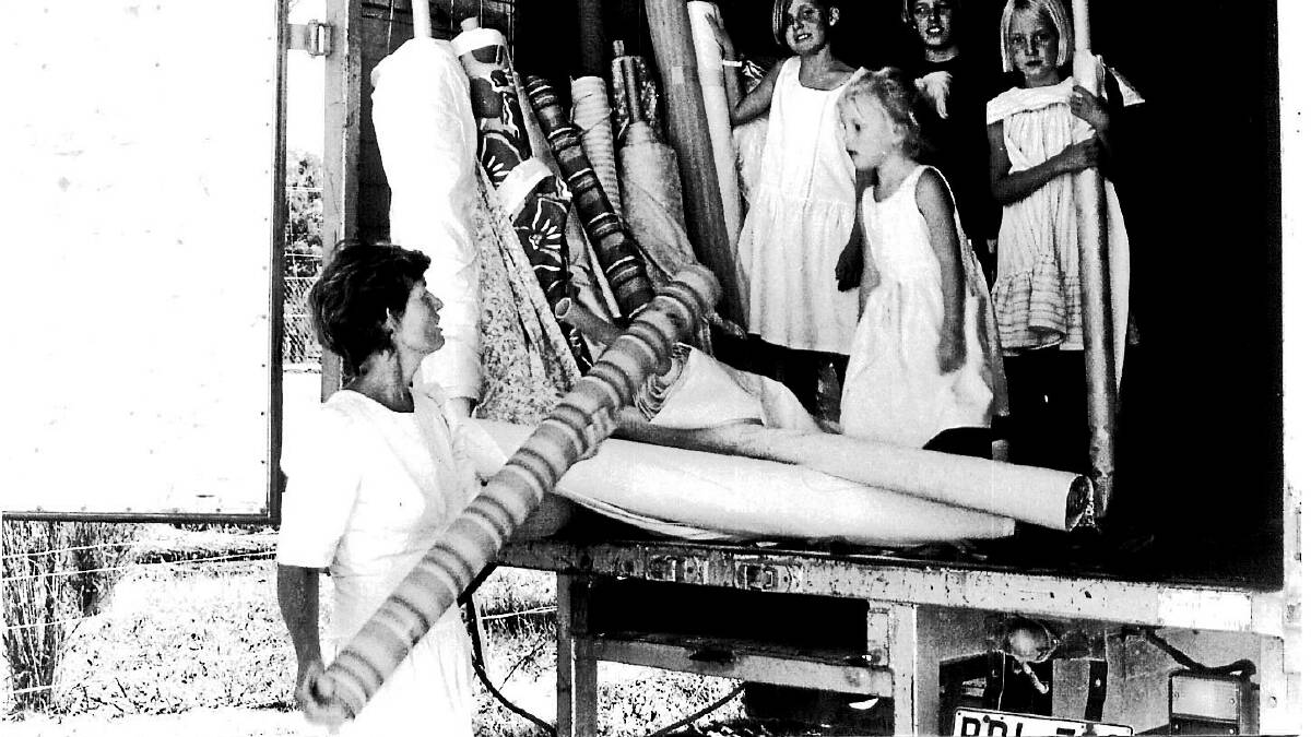Kay Norton-Knight and her daughters selling fabric from the back of a truck in the early 1980s. 