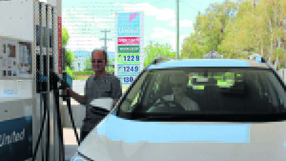 Trevor Ivers and his wife have been buying fuel from the United Service Station for a couple of years. The Sydney Road servo had the cheapest unleaded petrol in town on Friday. 