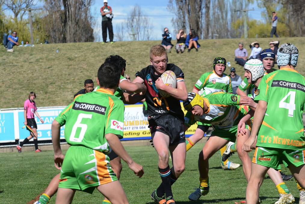 CAME CLOSE: Adam Fearnley and the Panthers under 15s side couldn’t quite reel in Orange CYMS in Saturday’s Group 10 Junior Rugby League grand final. Photo: PHILL MURRAY 092014ppanthers2