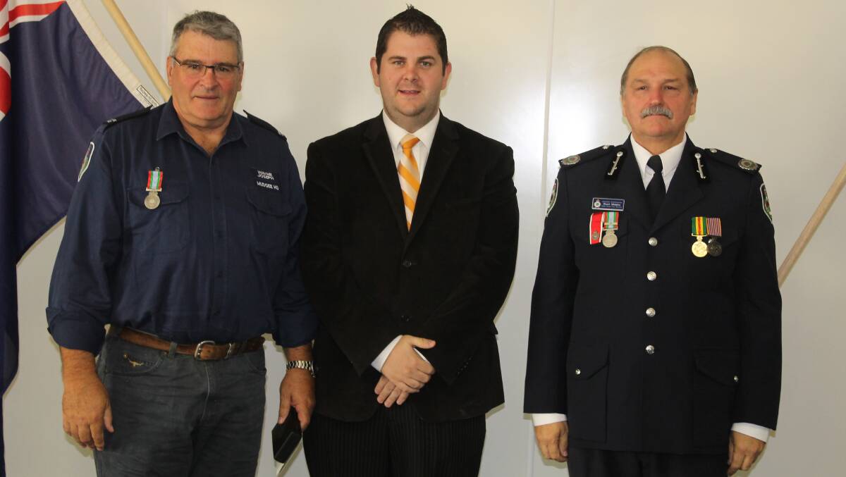 Wayne Joseph of the Mudgee HQ Brigade received the long service medal for 10 years service, he is pictured with Mid-Western Regional Council Deputy Mayor Cr Paul Cavalier and NSW RFS Assistant Commissioner Stuart Midgley.