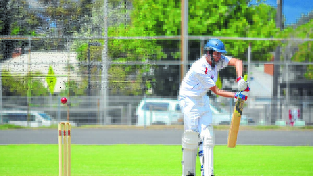 Paragon Hotel batsman Luke Norris is fortunate this Mitch Hearn delivery floated over the stumps and not into them. Photo: BEN HARRIS