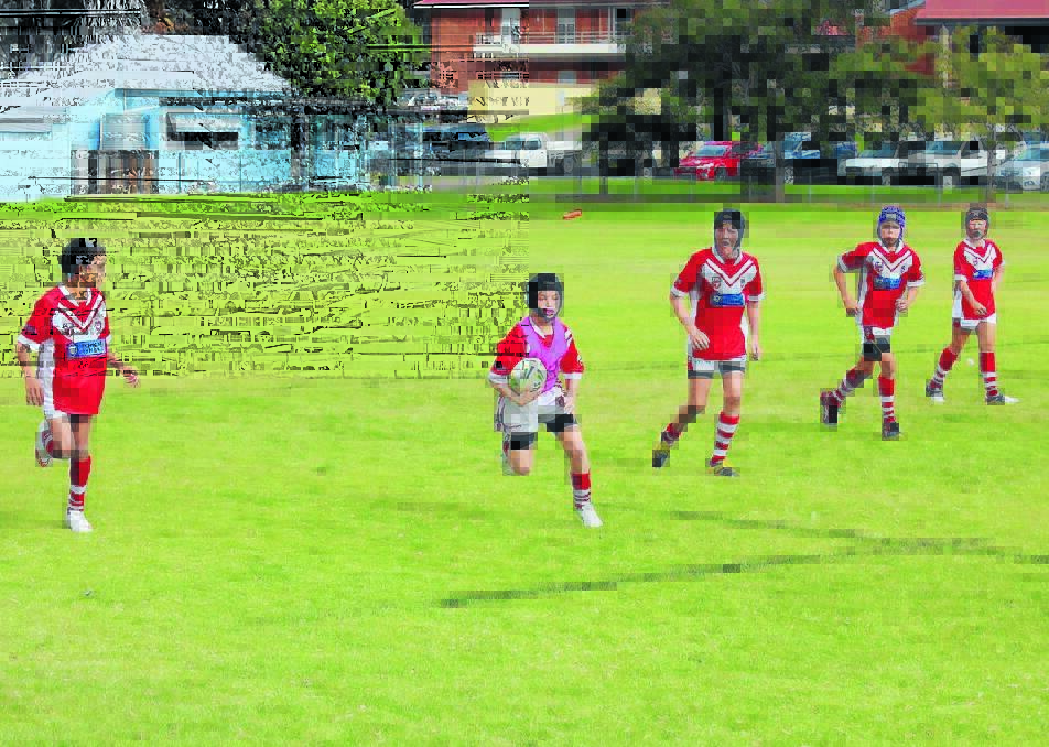 Mudgee’s Brett Doherty looks to take another hit-up for the under 12s last weekend at Cahill Oval.