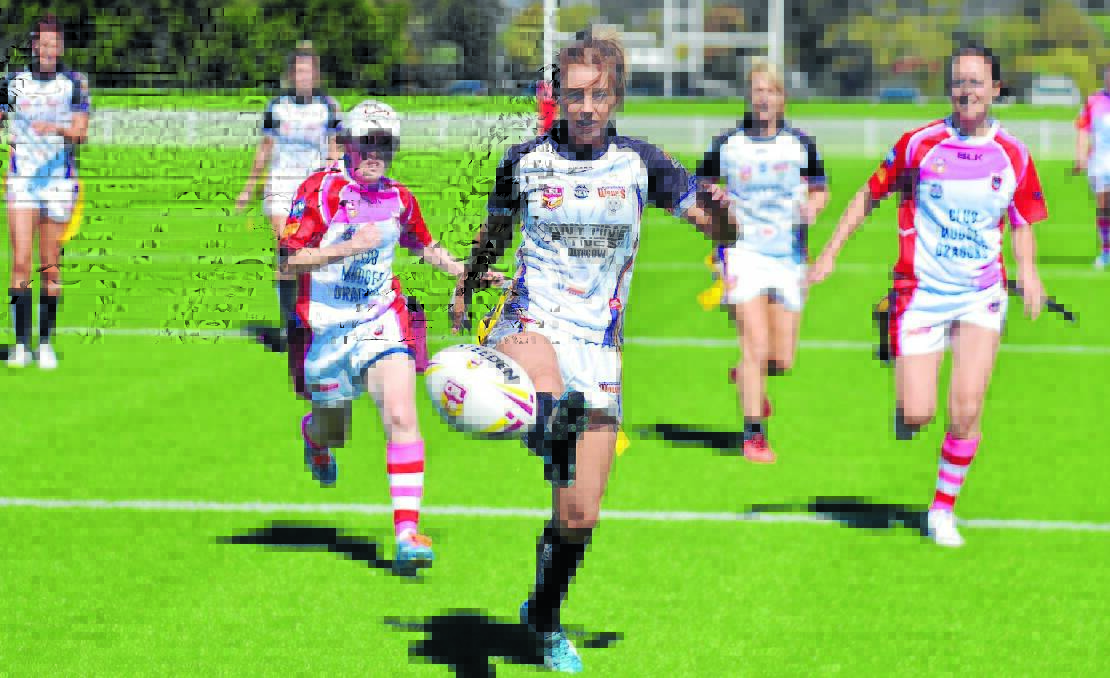 The pressure of the Mudgee kick-chase forces Lithgow to kick the ball dead in what was an impressive display all-round for the Dragons in their first home game of the season.