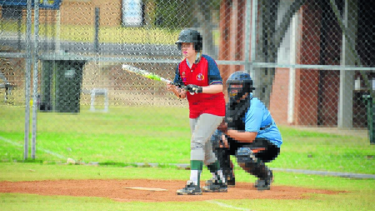 Maddie Date steps up to the plate during Mudgee Softball on Saturday. 	PHOTO: COL BOYD