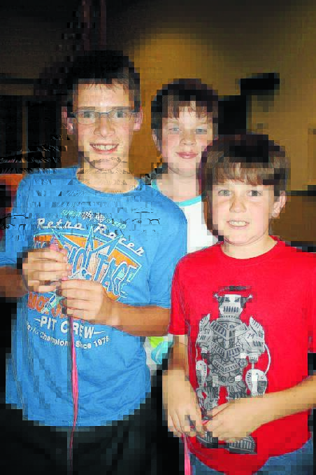 Trivia buffs Archie Roberts, Duncan McNeill and Connor McNeill.