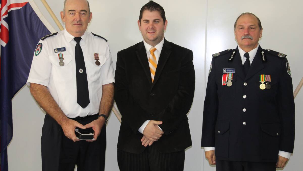 Alan Selman of the Mudgee HQ Brigade received the National Medal, he is pictured with Mid-Western Regional Council Deputy Mayor Cr Paul Cavalier and NSW RFS Assistant Commissioner Stuart Midgley.