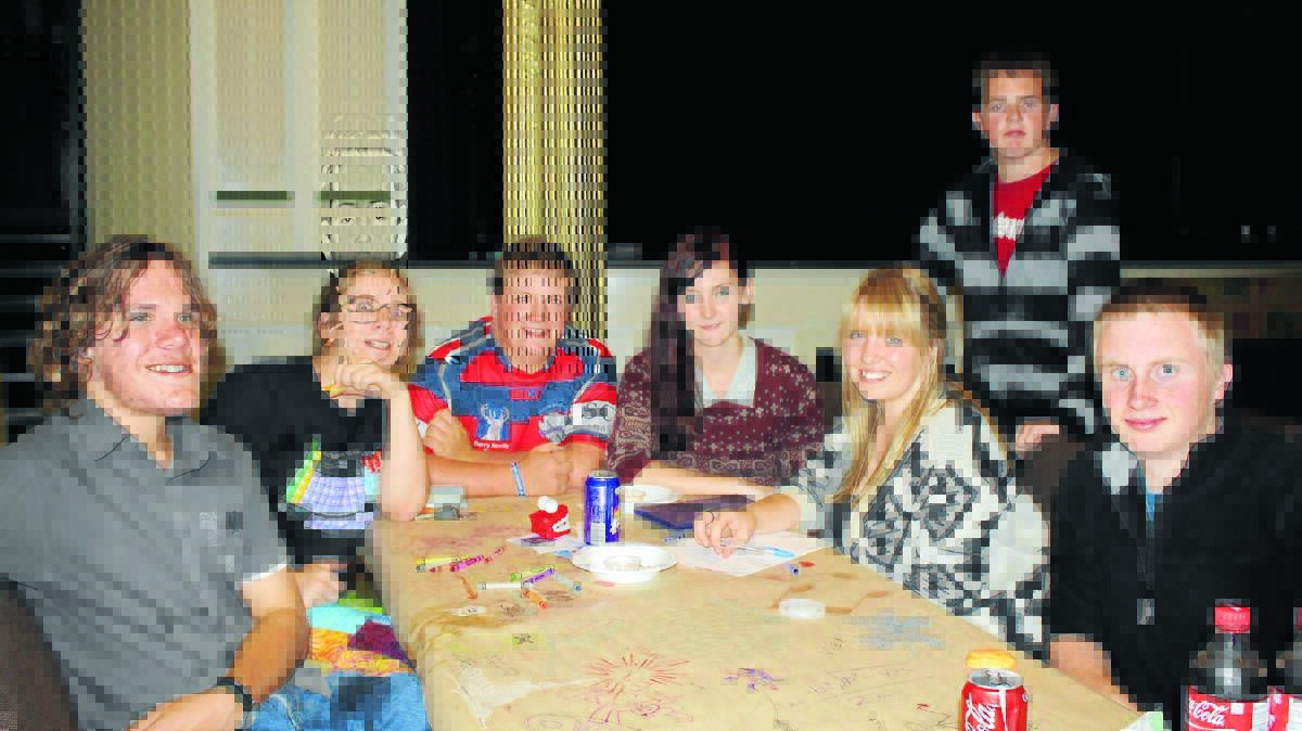 George Curan, Heather Wilson, Josh Marshall, Claudia Fuller, Nikita Marshall, James Keeley and Galen Cole wrestle with tricky trivia questions.