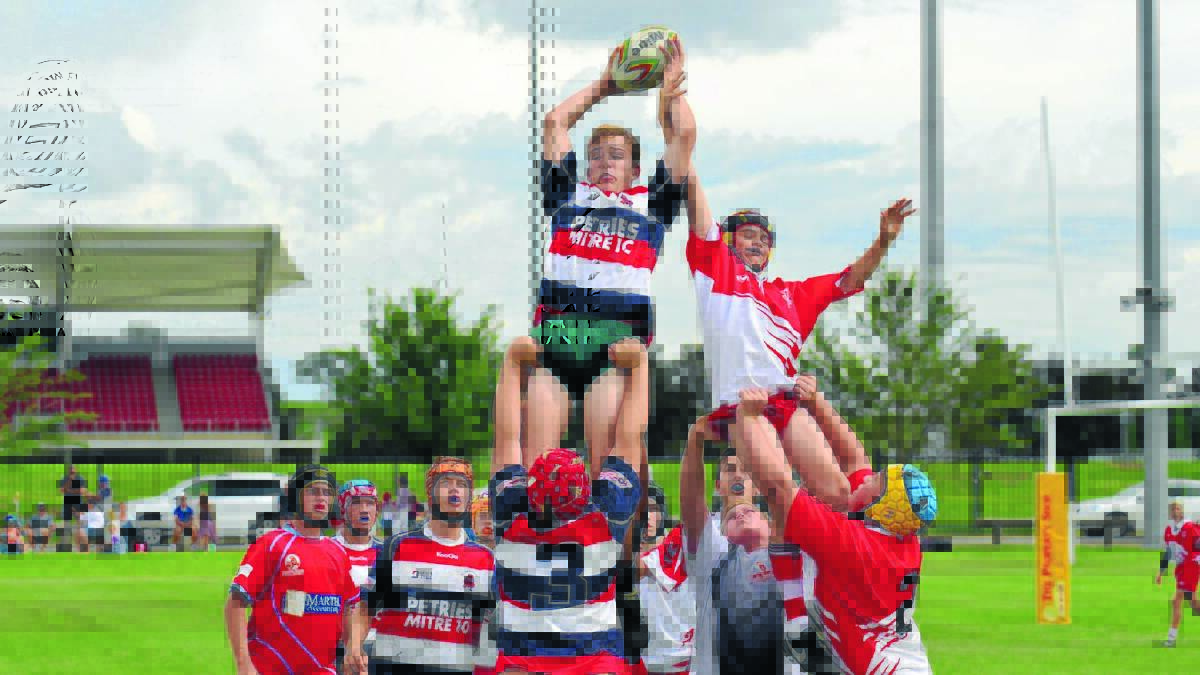 ON TRIAL: A Central West (left) and Central North player come together at the lineout during one of several trial matches at Glen Willow Regional Sporting Complex yesterday.