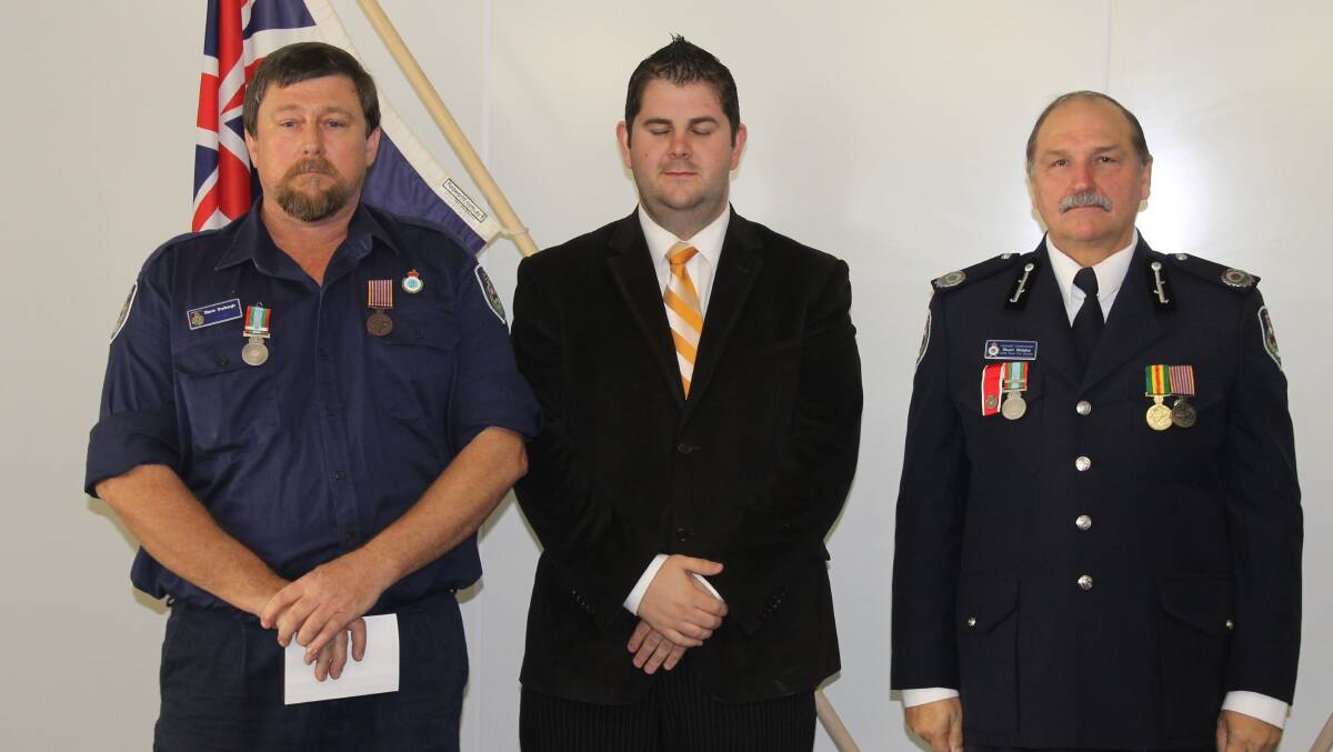 Steve Dryburgh received the long service medal and 1st clasp for 23 years service as a member of the Yarrabin, Ingleside and Mudgee HQ brigades, he is pictured with Mid-Western Regional Council Deputy Mayor Cr Paul Cavalier and NSW RFS Assistant Commissioner Stuart Midgley.