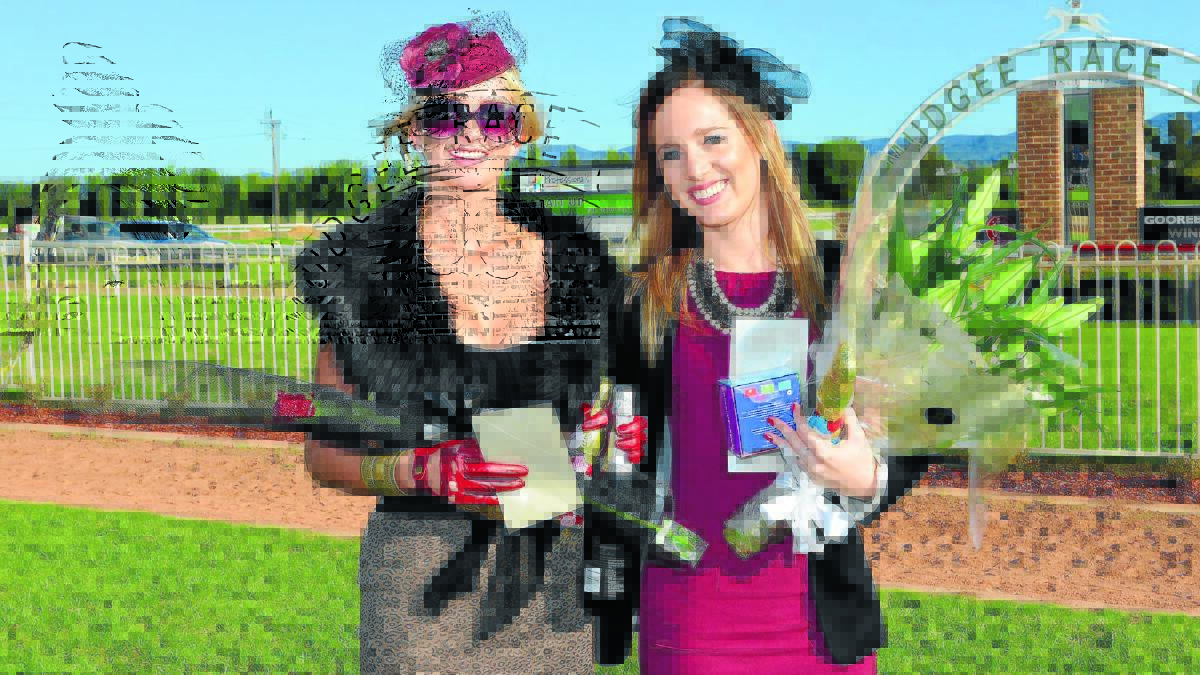 The winner of the ìBest Hatî, Ellise Baskerville of Mudgee, with the winner of the Fashion in the Field, Evelyn Meads of Sydney.