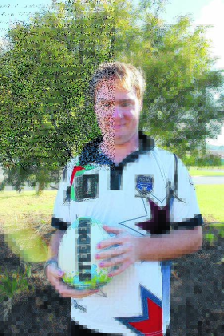 Mudgee local Jonathan Day has been selected for the Physical Disability League’s City versus Country match in Tamworth this Saturday. He is pictured with a half ball used to practice throws against a wall.