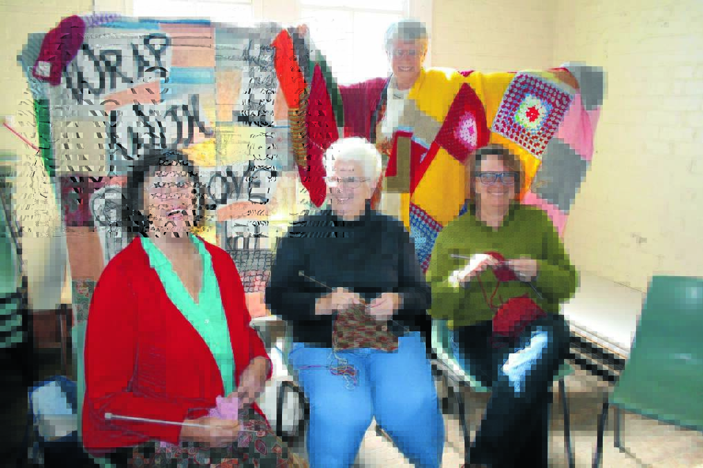 Knitting squares at the Rylstone markets for Wrap With Love in 2014 were Sue Pridmore, Jeanette Marchant, Jo Williams and Sandra McIntosh.
