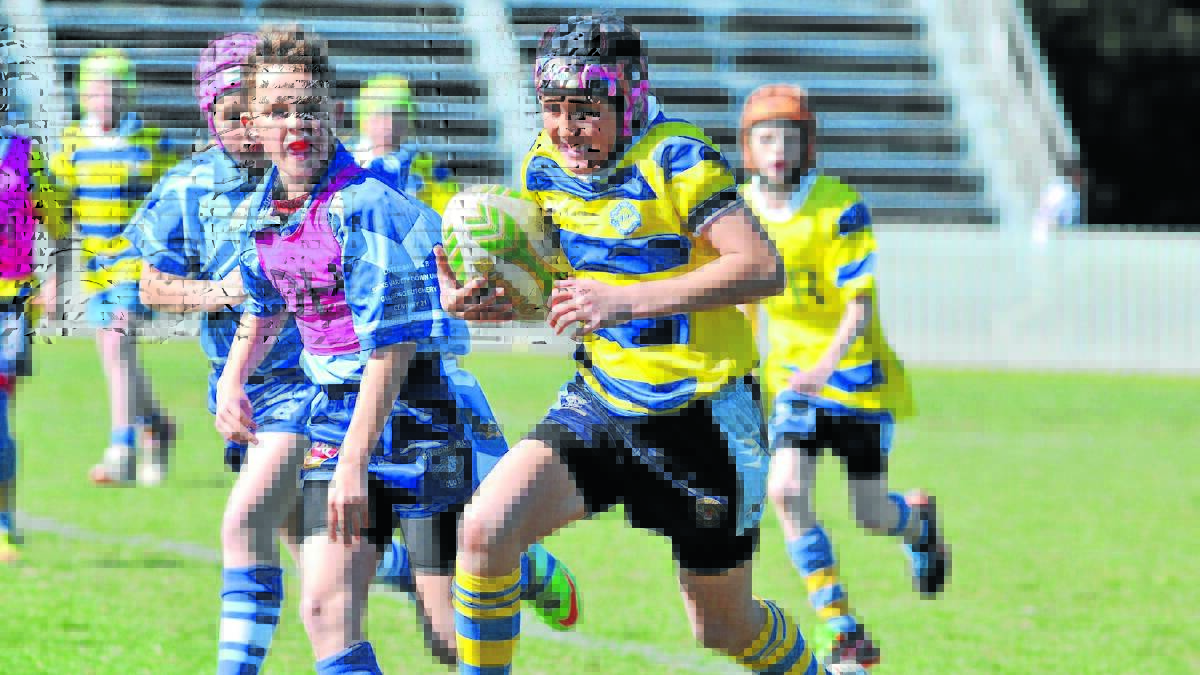 OPS’ lock Kaden Williams is chased by the Gulgong defence in his side’s big win.