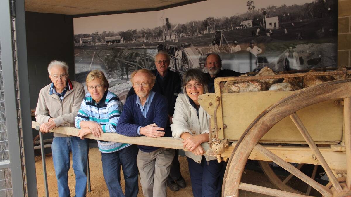 Henry Lawson Heritage Festival organisers Kevin Robson, Jan Robson, Charles Vassel and Cheryl Vassel check out the new Red Hill Gulgong Gold Experience with volunteers Maurice Gaudry and David Warner (back). The display under Red Hill will have its official opening on the weekend as part of the program of heritage events.