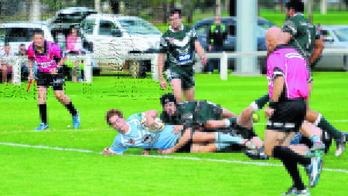 Tom Reddish dives over for the Gulgong Terriers’ first try in their win over Dunedoo last Saturday. PHOTO BY COL BOYD