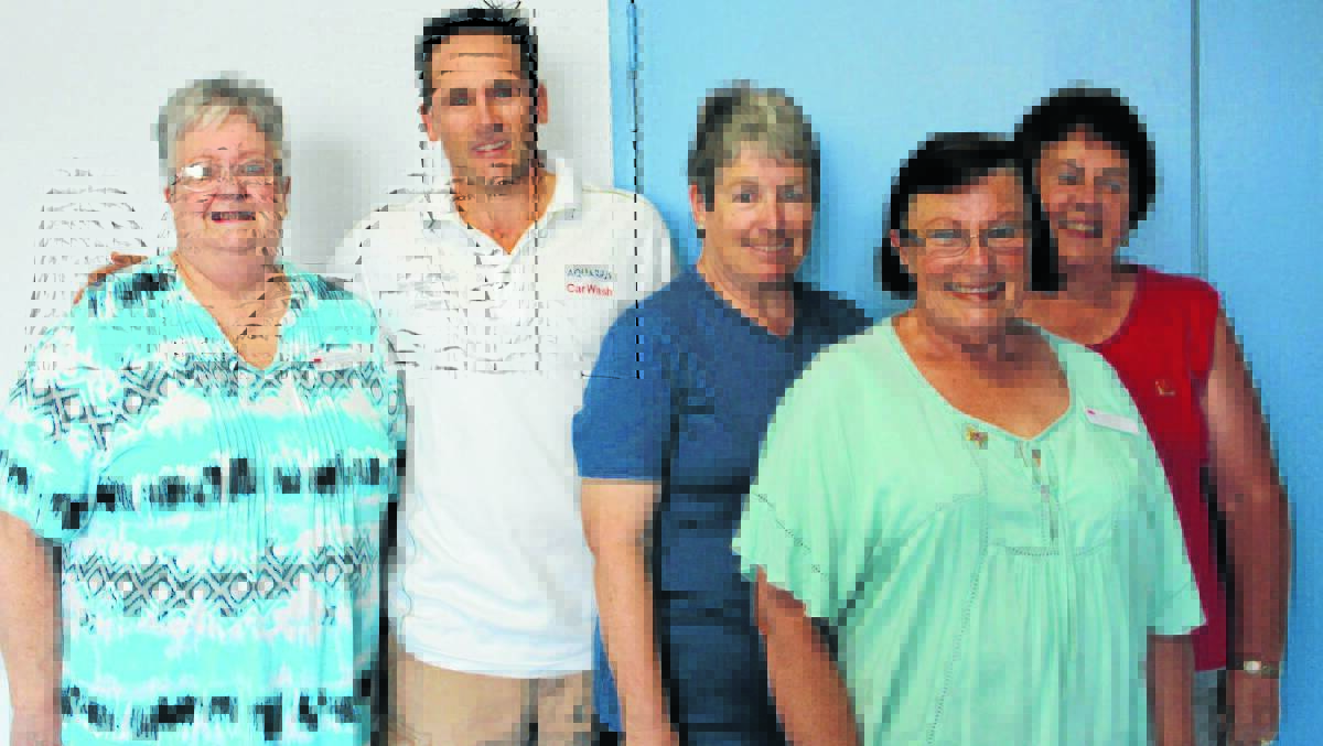 Hospital Auxiliary cleans up after charity car wash