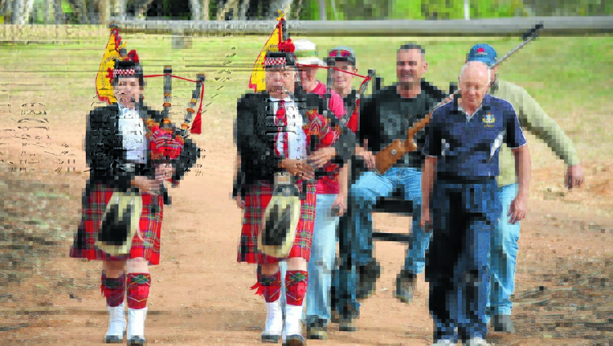 TRADITION: Orange Rifle Club member Mark Thurtell (right) is chaired to the presentation after winning the 91st Mudgee District Rifle Association’s Easter Open last year. PHOTO: BEN HARRIS