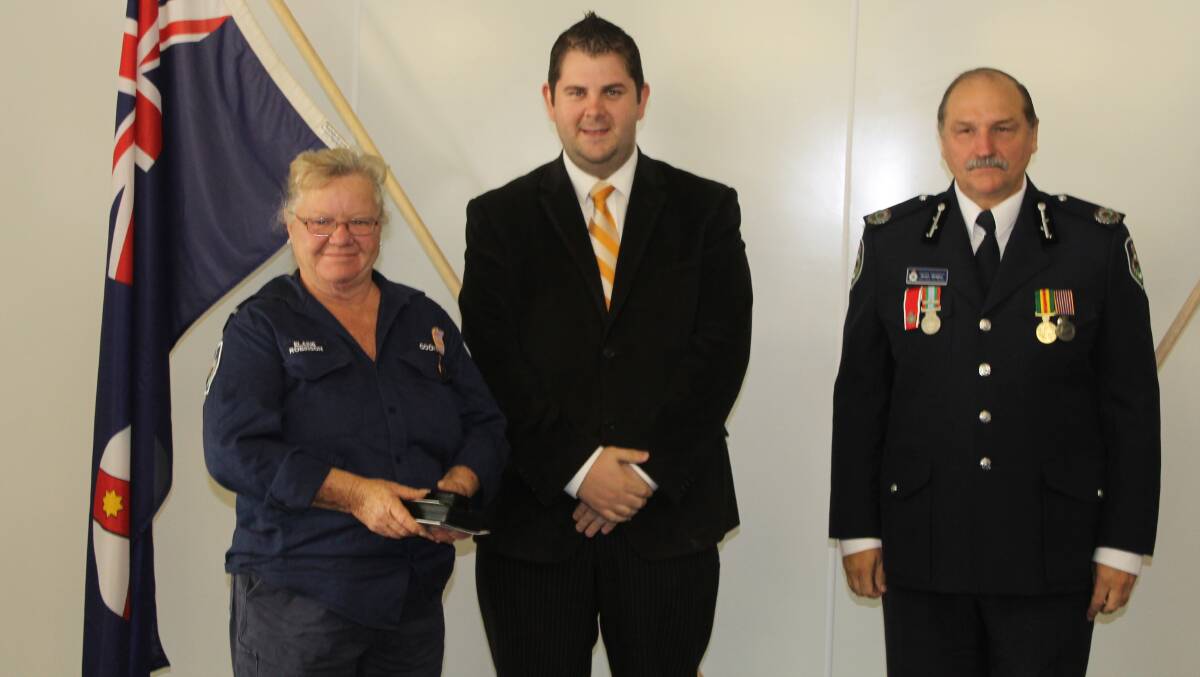 Elaine Robinson of the Cooks Gap Brigade was a recipient of the National Medal, she is pictured with Mid-Western Regional Council Deputy Mayor Cr Paul Cavalier and NSW RFS Assistant Commissioner Stuart Midgley.