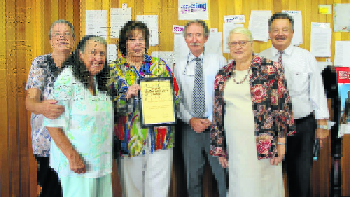 Mudgee Valley Writers Group members Joy Hibberd, Miriam Bates, Jill Baggett and Kevin Pye with Mid-Western Regional Councillors Esme Martens and Percy Thompson at the Mudgee Seniors Week lunch, where the group received the Mudgee Seniors Award.
