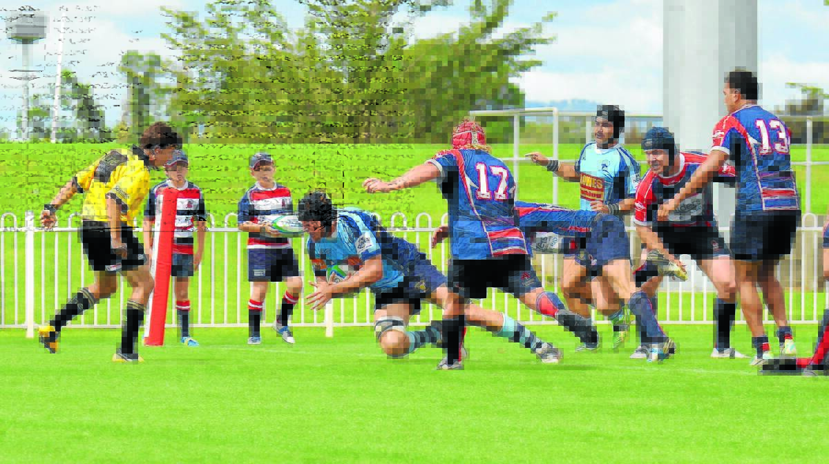 CAN MUDGEE SCORE: Lachie McCutcheon scores for Central West Blue Bulls during the NSW Country Rugby Union Championships at Glen Willow Regional Sports Stadium last month. Mudgee may host a National Rugby Championship match. PHOTO: COL BOYD