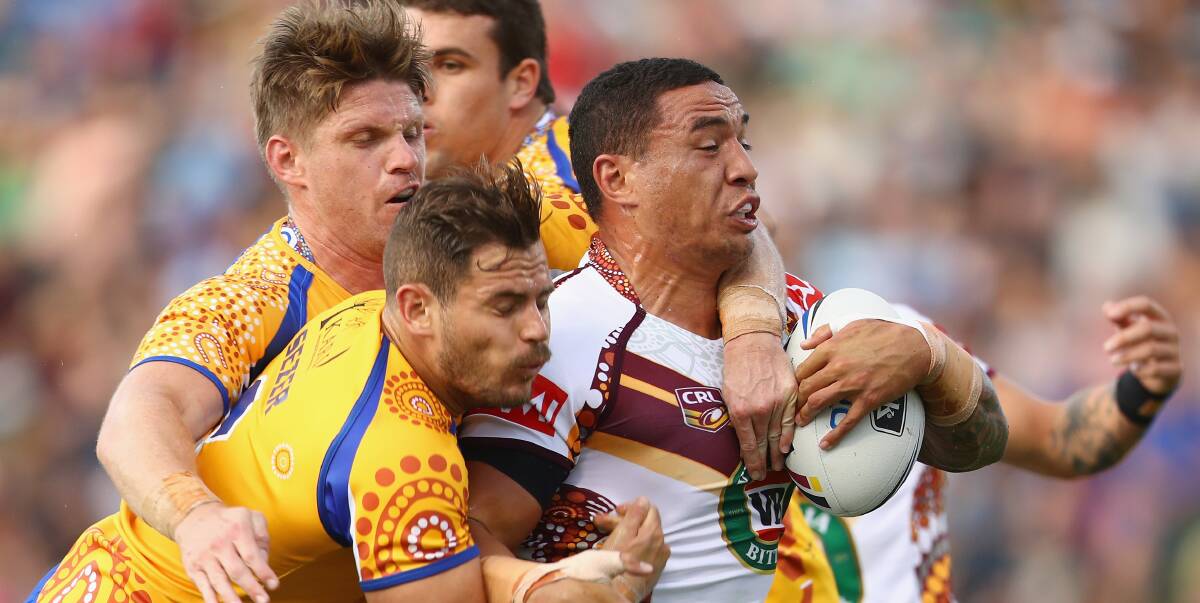 ALL HANDS ON DECK: Country's forward Tyson Frizell - now a NSW State of Origin representative as well - fights off a handful of City players with his eyes on the prize in one of the recent City v Country clashes.