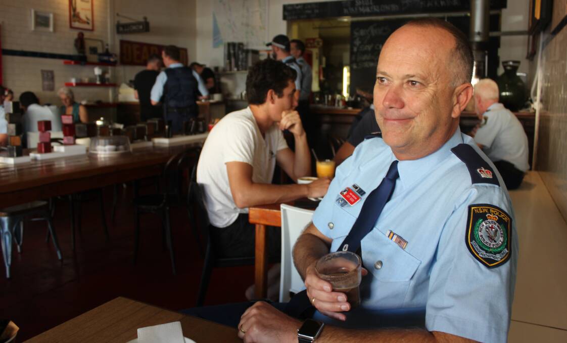 COFFEE CONNECTION: Chief Inspector Jeff Boon was one of the first officers to arrive at the Butcher Shop Cafe to mingle with the locals in the 'Coffee with a Cop' state initiative.