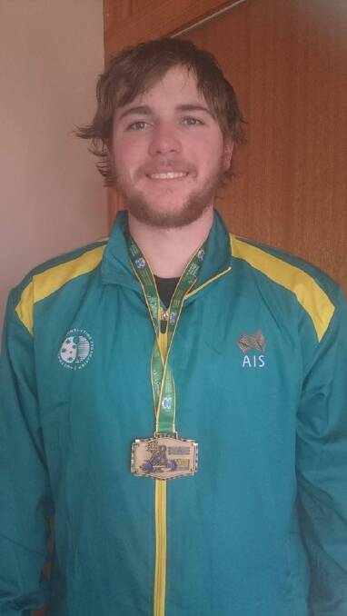 Will Portlock is a member of the Central Coast Weightlifting Club in Tasmania.