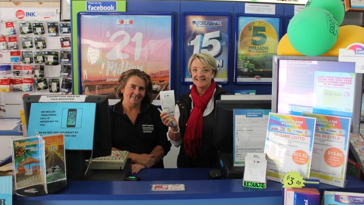 Lisa Robinson and Angela Fittler of Mudgee Newsagency where the winning pick was sold.
