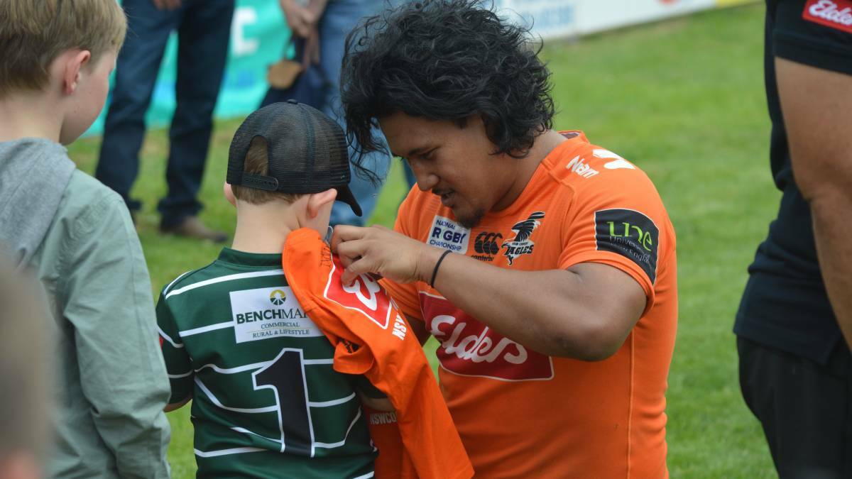 COUNTRY CALL: Eagles, and now Wallabies, hooker Brandon Paenga-Amosa signs an autograph after last year's NRC clash at Orange.