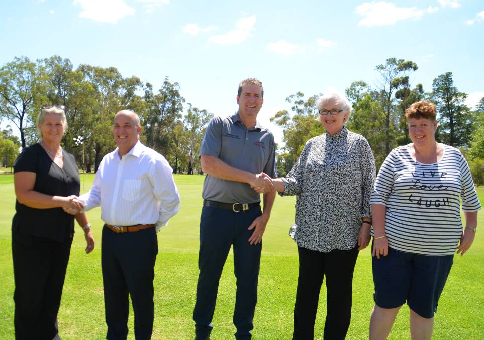 Fran Trisley, Steve Archinal, Peter Mayson, Carolyn Peek and Renea Williams gathered at the Mudgee Golf Club to celebrate the money raised from the event. 