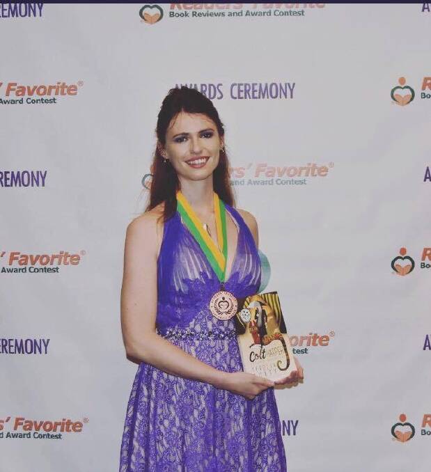 PRESTIGIOUS: Tyrolin Puxty won the Readers' Favourite award in Miami 2017 for her book 'Colt Harper: Esteemed Vampire Cat'.
 