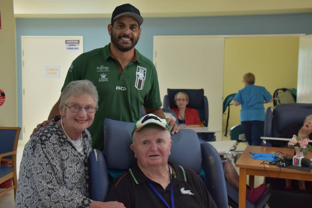 SOUTH SYDNEY FAITHFUL: Heather and Tom Deasy have been South Sydney fans for their whole life and were thrilled to see Greg Inglis drop by at Kanandah on Friday. Photo: Jake Humphreys 