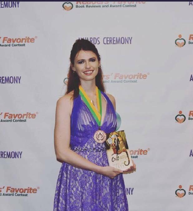 PRESTIGIOUS: Tyrolin Puxty won the Readers' Favourite award in Miami for her book 'Colt Harper: Esteemed Vampire Cat'.