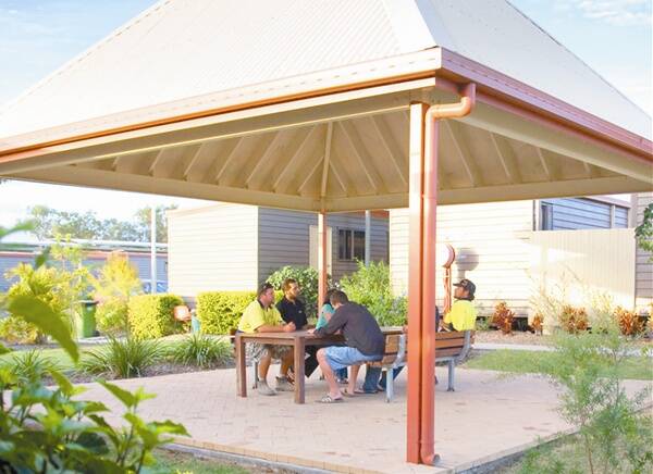 Workers in an outdoor area at The Mac Service’s Group accommodation in Nebo, Queensland.	 (Photo supplied by The Mac Services Group). 	FILE