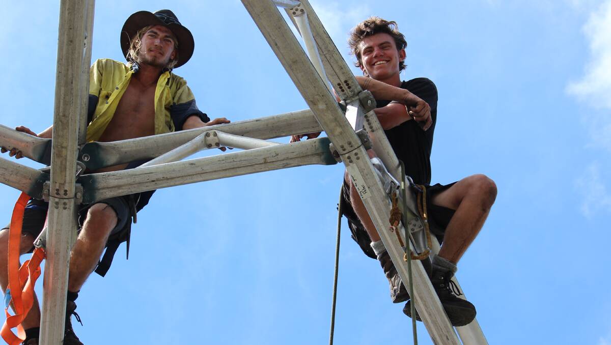 READY TO ROCK: On Thursday Josh Naylor and Henry Garrad of LB Rigging were two of several staff setting the stage for Mudgee’s A Day on the Green concert tomorrow. PHOTO: DARREN SNYDER 060314\ds ADOTG\0542