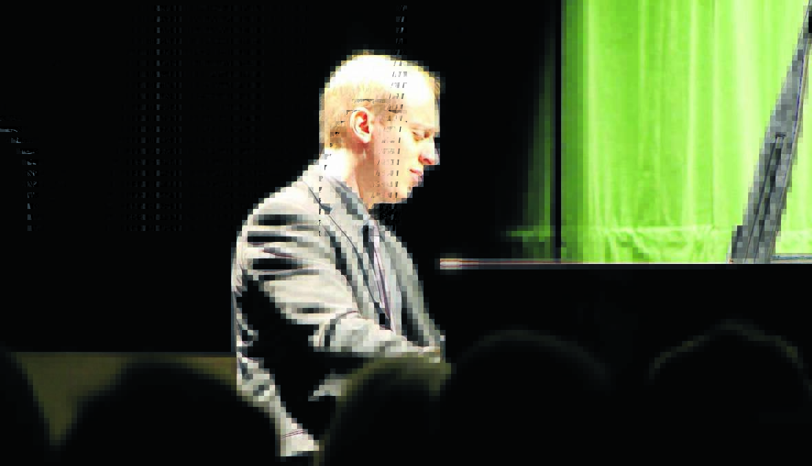 Simon Tedeschi, pictured during his concert with Ian Cooper at the Town Hall Theatre on Saturday night, says the acoustics of the revamped theatre resemble those of a venue worth many millions more. 