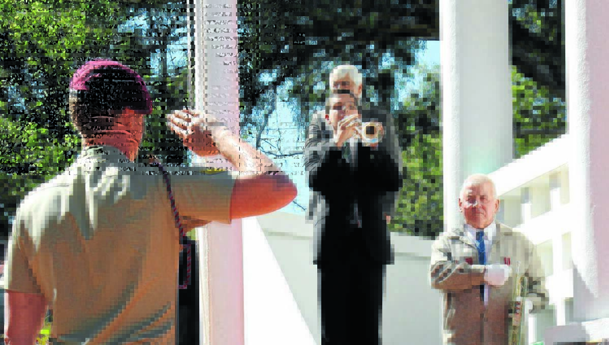 THE LAST POST: Bugler Logan Birchall performs the The Last Post at Gulgong’s Commemoration of Anzac Day, also pictured are Harry Kruger (right) and Corporal Michael Dunston (saluting).