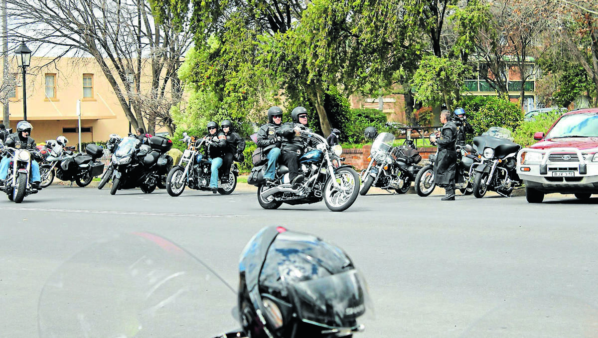 RIDE BY: The Black Dog Ride to Red Centre came through Mudgee on Saturday on the way to Alice Springs. The ride aims to raise awareness of depression and mental health issues.