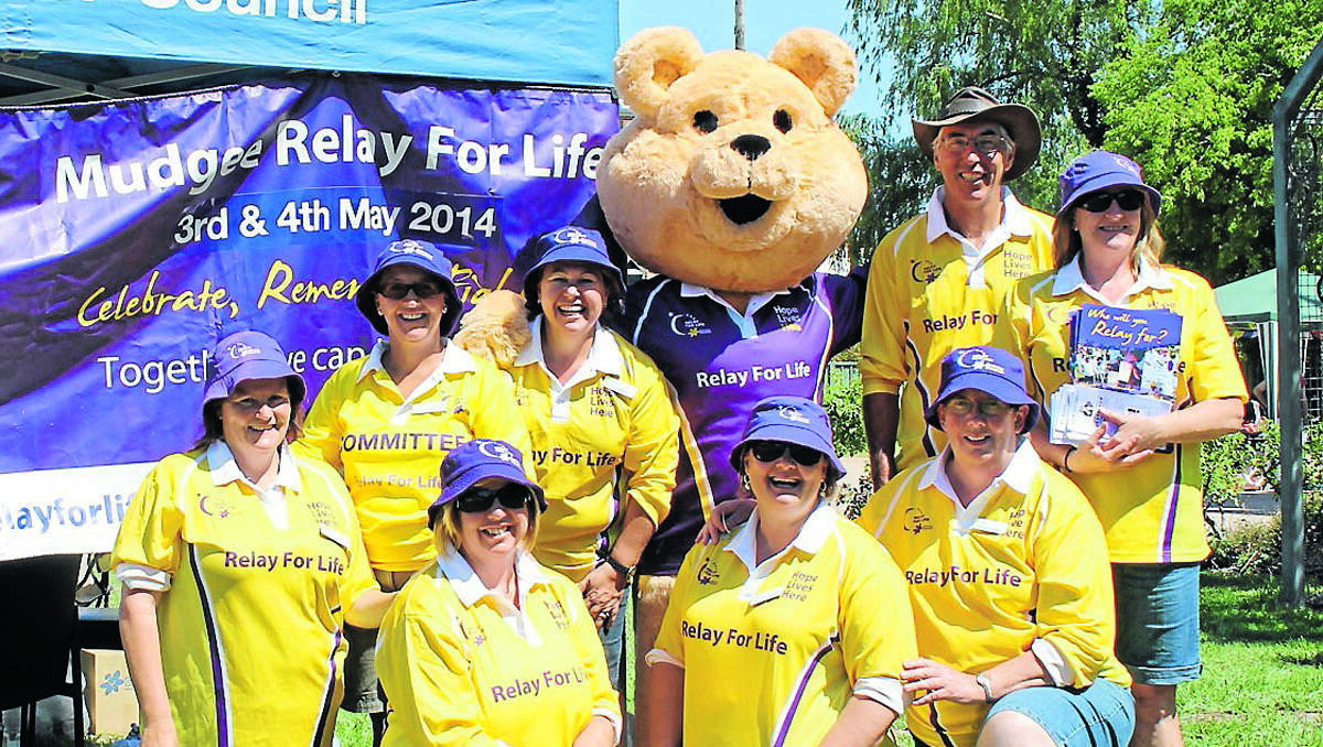 Cancer Council mascot Dougal Bear and some of the organising committee members officially launched the 2014 Mudgee and Districts Relay For Life on Saturday. Pictured are (from left), Trey Smith, Rebecca Redfern, Kris Morrison, Debbie Degoumois, Christina Caughey, Maureen Bennett, Ian Hunter, and Gabrielle Condon.