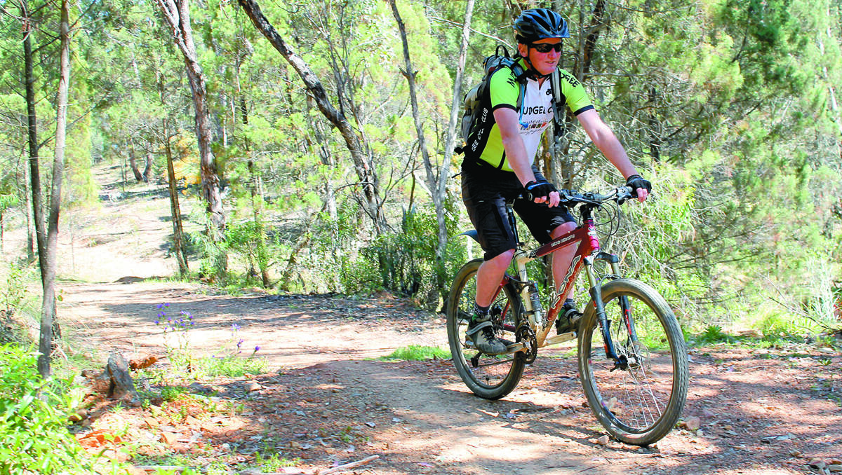 Russell Conchie rides through the Mudgee Common, which has been approved as a mountain bike park. 	021012/bikes/2