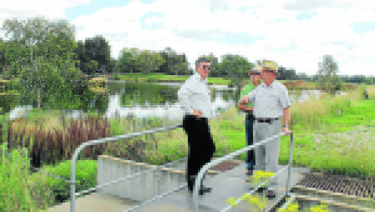Mayor Des Kennedy discusses plans for the Putta Bucca Wetlands with Dad’s Army members Rick Arnott and Paul O’Brien on Tuesday.  130213spaine putta bucca 008 