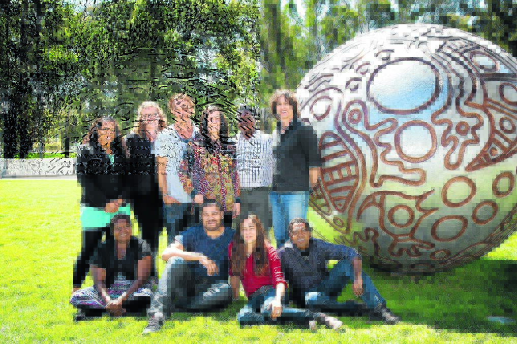 Participants in the Wesfarmers Arts Indigenous Leadership program in front of the work  Eran (2010) by Thanakupi at the National Gallery of Australia, Canberra: (Top row, from left): Thelma Savage (Thursday Island); Aleisha Lonsdale (Mudgee); Anthony Walker (Byron Bay); Shari Lett (Sydney); Yinimala Gumana Nhulunbuy (Yirrkala); Kent Morris (Melbourne); (Seated, from left): Jennifer Dickens (Fitzroy Crossing); Teho Ropeyarn (Cairns); Coby Edgar (Adelaide); Terry Murray (Fitzroy Crossing)