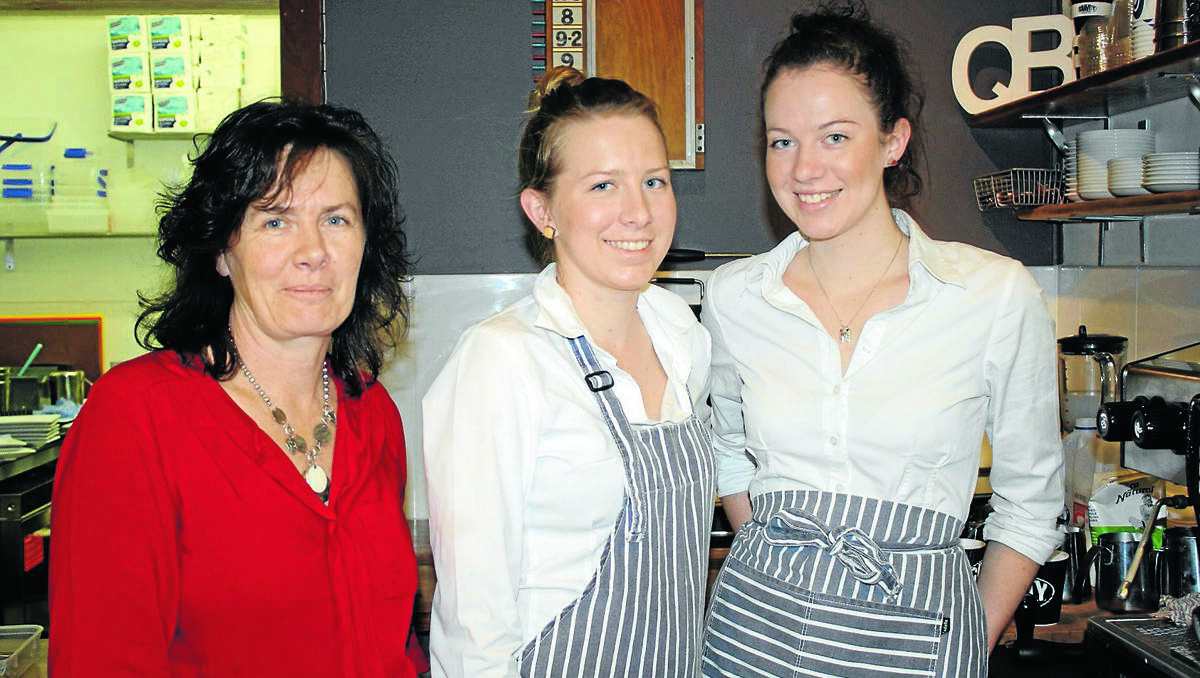 A FAMILY AFFAIR: Maria, Gyan and Hannah Endacott behind the counter of The Quick Brown Fox.	280912/hpquickbrownfox/002