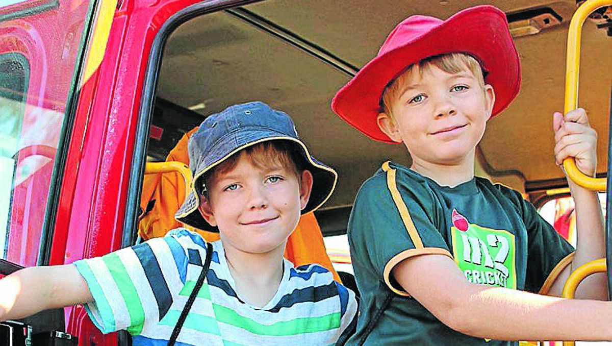 James and Daniel Pegg checked out the fire truck at the Moolarben Coal open day.