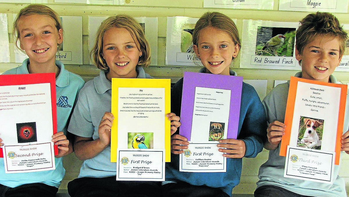 Hargraves Public School students (from left) Stella Peppernell-Baks, Bridget O’Brien, Siobhan Bastow, and Rhees Hancock, dominated the Literature Awards at the Mudgee Show.	190313/HargravesPS/9536