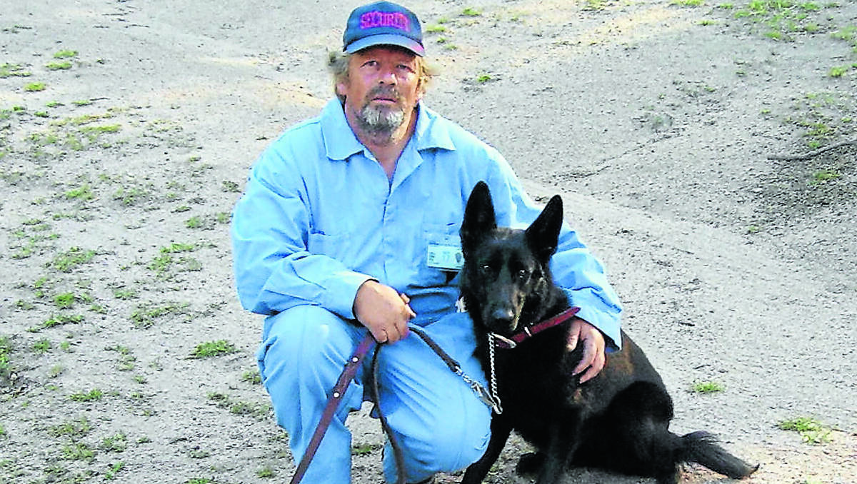 Norman Buggle, pictured with dog K9, is looking to open up a pet cemetery in the region.