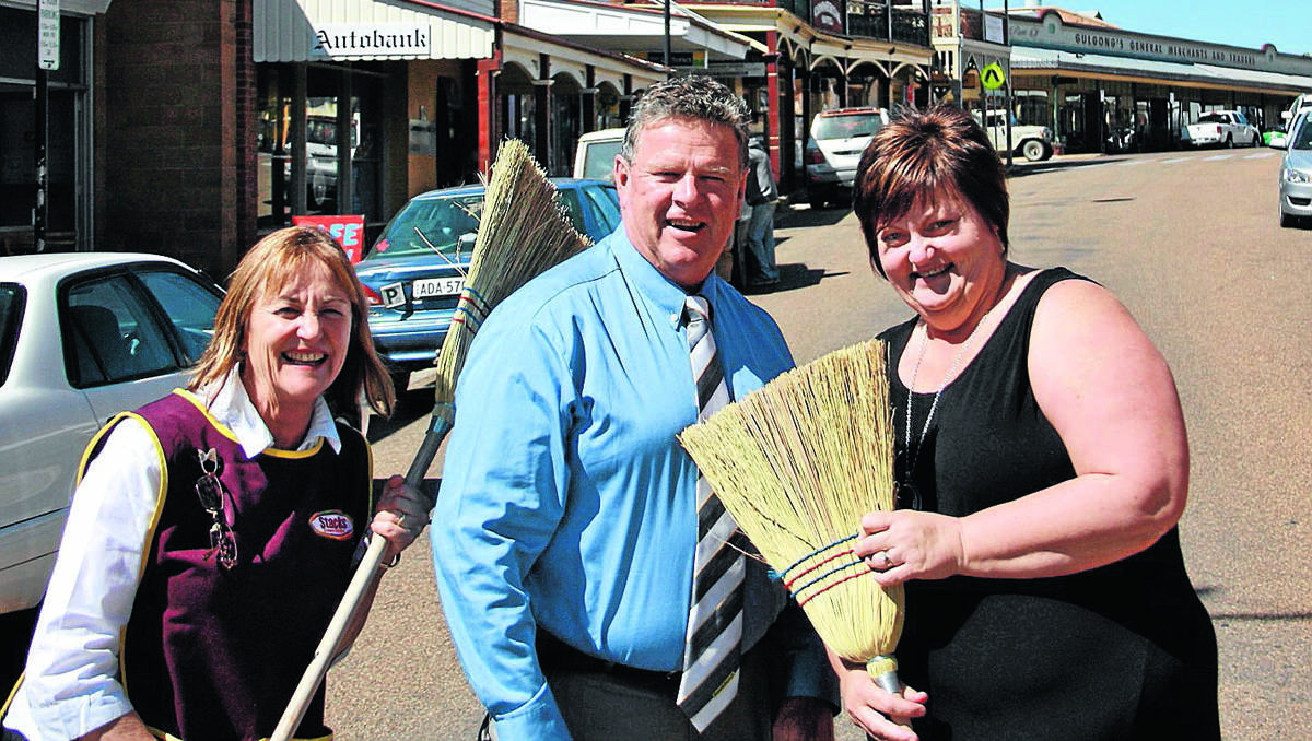 PREDICTING A CLEAN SWEEP: Marg Meredith, Bruce McGregor and Darlene Curry are warming up for the chook races to be held as part of the Back to Gulgong Weekend.