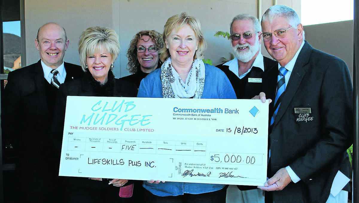 Club Mudgee’s David Lang, Maureen Heywood, Judy Hitchcock, Fave Holden and Bill Kerr present Lifeskills Plus Carolyn Peek with the first of many donations.